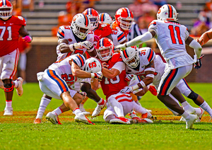 Syracuse football dropped its third consecutive game to No. 1 Clemson, but the Orange kept up with the Tigers for three quarters and forced Trevor Lawrence into his first collegiate pick six.