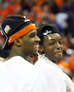  C.J Fair #5 and Jerami Grant #3 of the Syracuse Orange smile as the celebrate their win over the Marquette Golden Eagles.