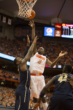 Jerami Grant finishes a drive in the lane for two of his 12 points. 