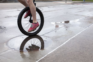 Max Perrin, a junior civil engineering major and one of the few unicyclists on campus, rides his unicycle daily to and from class.