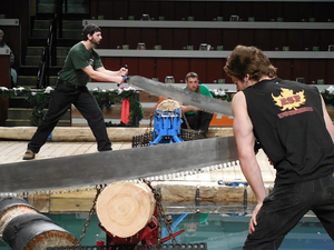 Evan McFee, a student in the State University of New York College of Environmental Science and Forestry, competes in the Collegiate IRONJACK World Championship in Pigeon Forge, TN. The competition includes events such as single buck, in which competitors use a long saw to cut wood in one swing. courtesy of ann marie mcfee