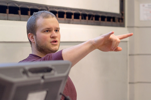 Josh Stangle, a TA in the math department, lectures. Stangle and other TA's have to deal with low wages and high living expenses. 