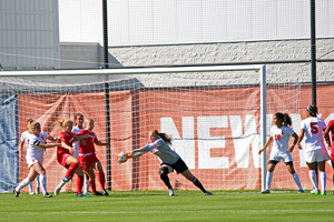 Syracuse goalkeeper Courtney Brosnan commanded an SU counterattack that allowed only three shots in a double-overtime, 0-0 tie.