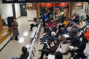 Melanie Littlejohn leads a discussion at the first Consensus merger meeting on Feb. 1. Consensus hosted a third meeting on Monday.