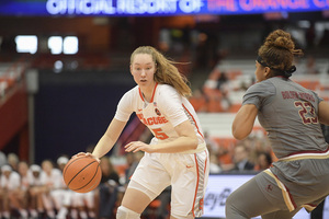 Digna Strautmane drives to the rim. Her play has improved to achieve the 