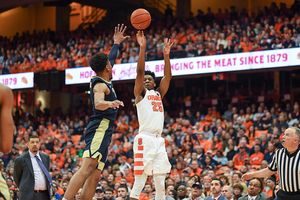 Tyus Battle shoots over a Pittsburgh defender.