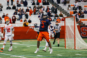 Virginia attack Ian Laviano celebrates after the Cavaliers get a goal to go in their win.