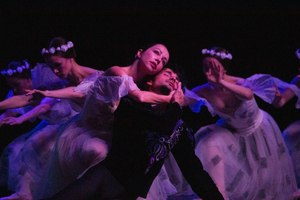 Giselle, played by Kateryna Kukhar, holds Albrecht as he mourns her death. The Grand Kyiv Ballet’s performance of “Giselle” visited the Palace Theatre on Tuesday night. 
