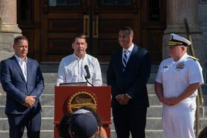 Ben Walsh, Ryan McMahon, Franklin Parker and Stephen “Josh” Jackson (left to right) proclaim the commencement of Navy Week in Syracuse. The initiative aims to increase community outreach in cities “without a significant Navy presence.”