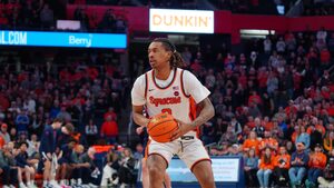 Our beat writers are split on whether No. 14 Syracuse will keep their season alive against No. 11 Florida State in the ACC Tournament First Round.