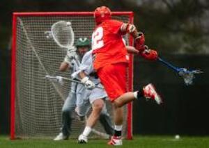 Dan Hardy scores on Loyola goalkeeper Alex Peaty during Syracuse's 14-13 last-second comeback over the Greyhounds Saturday in Baltimore. 