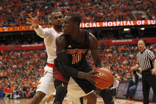 James Southerland defends against Louisville's Gorgui Dieng. Southerland had 13 points, seven rebounds and an assist. He shot 5-of-12 from the field and 3-of-5 from 3 range. Dieng had a double-double with 11 points and 14 boards.