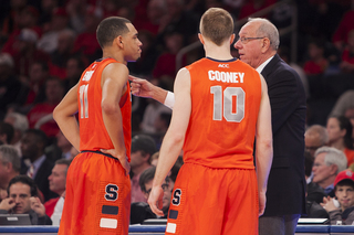 Jim Boeheim directs his starting backcourt during the first half. Syracuse led by as many as 14 in the opening frame.