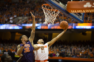 K.J. McDaniels blocks a Tyler Ennis layup attempt. 