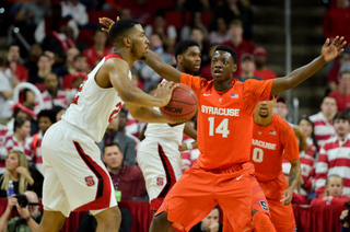 N.C. State's Ralston Turner looks to pass to his right while being defended by freshman point guard Kaleb Joseph.