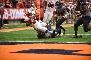 Syracuse makes a tackle near the goal line.