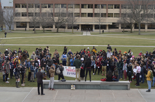 Approximately 100 students gather on the Quad for the Women’s Day Sanctuary Campus Rally.