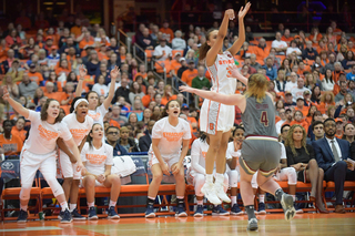 Syracuse bench players often celebrate made 3-pointers. 