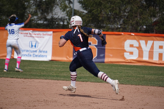 Holmgren rounds second base.